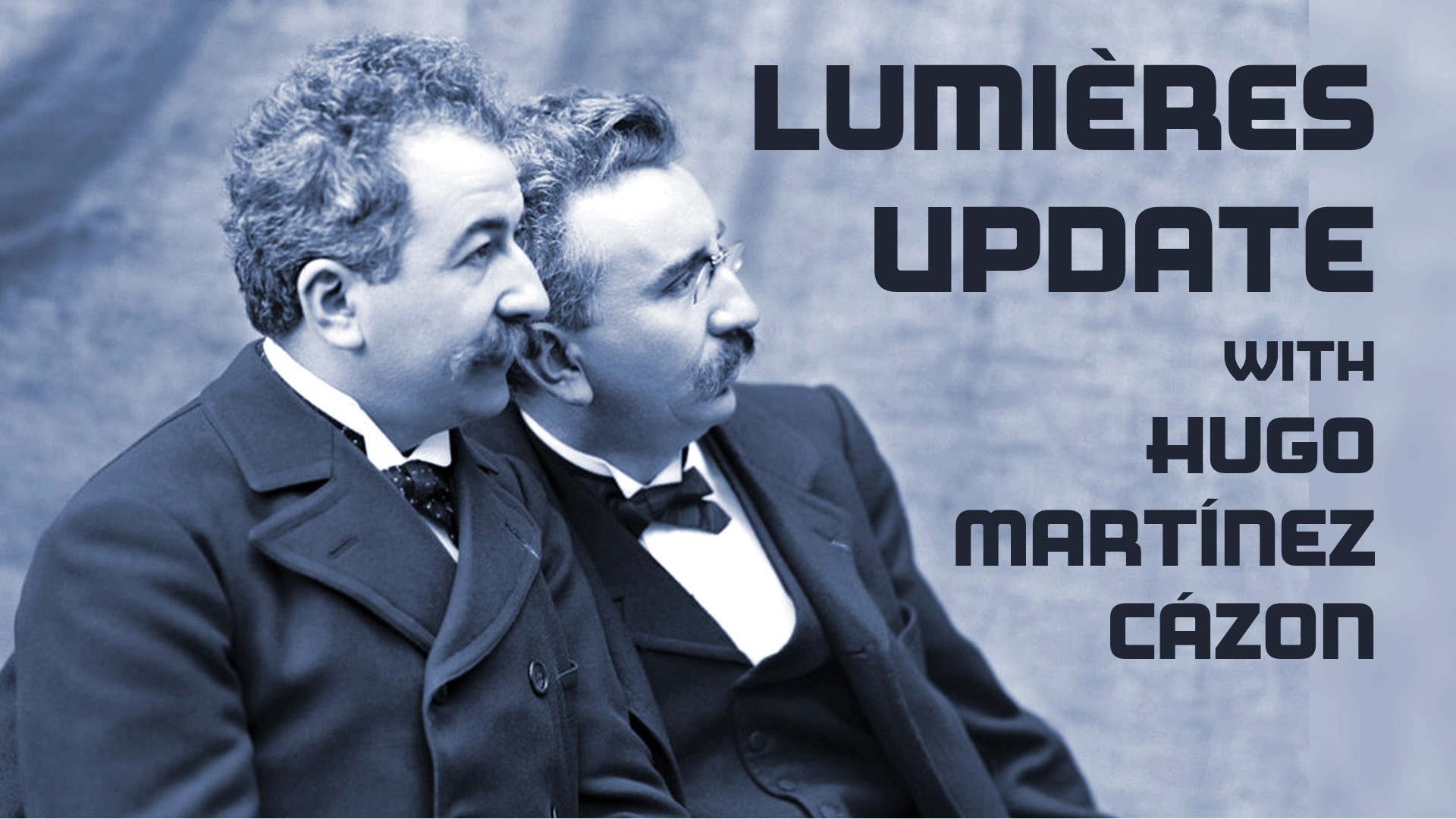 old photo of Lumière Brothers, looking at something to their left.